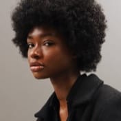 profile picture of black woman with a afro